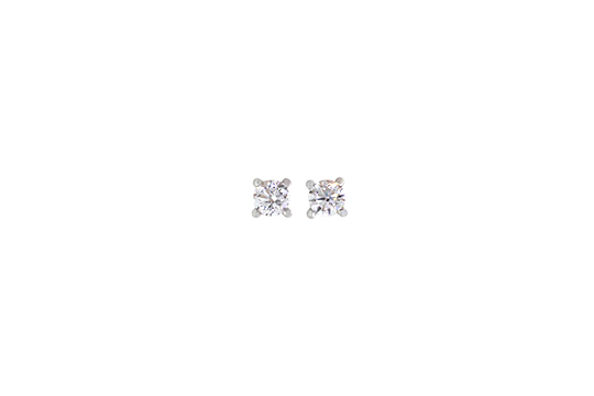 1 PAIO DI ORECCHINI PUNTO LUCE IN O.B. 18 KR. CHE INCASTONANO 2 BRILLANTI PER COMPL. KT. 0,80 C.a CLASSIFICABILI: PUREZZA VS, COLORE E-G (RIVER) GR. TOT. 1,70