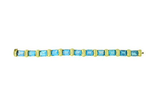 1 BRACCIALE IN O.G. 18 KR. FIRMATO TREA CHE INCASTONA PIETRE SEMIPREZIOSE GR. TOT. 39,00