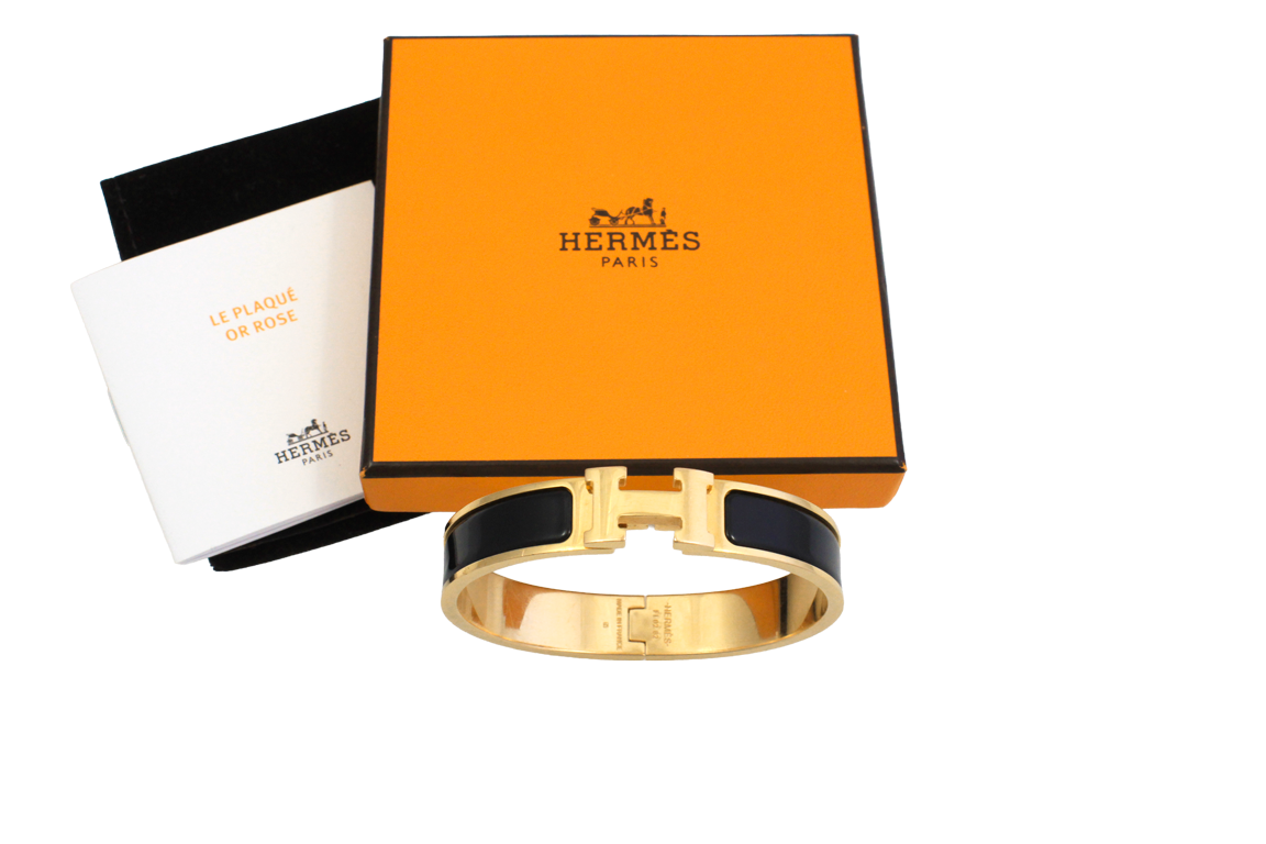 1 BRACCIALE FIRMATO HERMÈS “CLIC H” IN METALLO PLACCATO ORO ROSA E SMALTO NERO, (MISURA 17 CM) FORNITO DI SCATOLA ORIGINALE